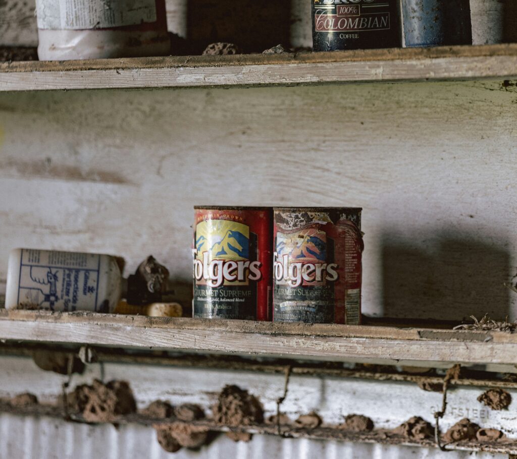 old coffee folgers stored on shelf
