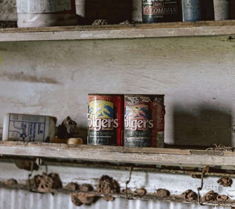 old coffee folgers stored on shelf